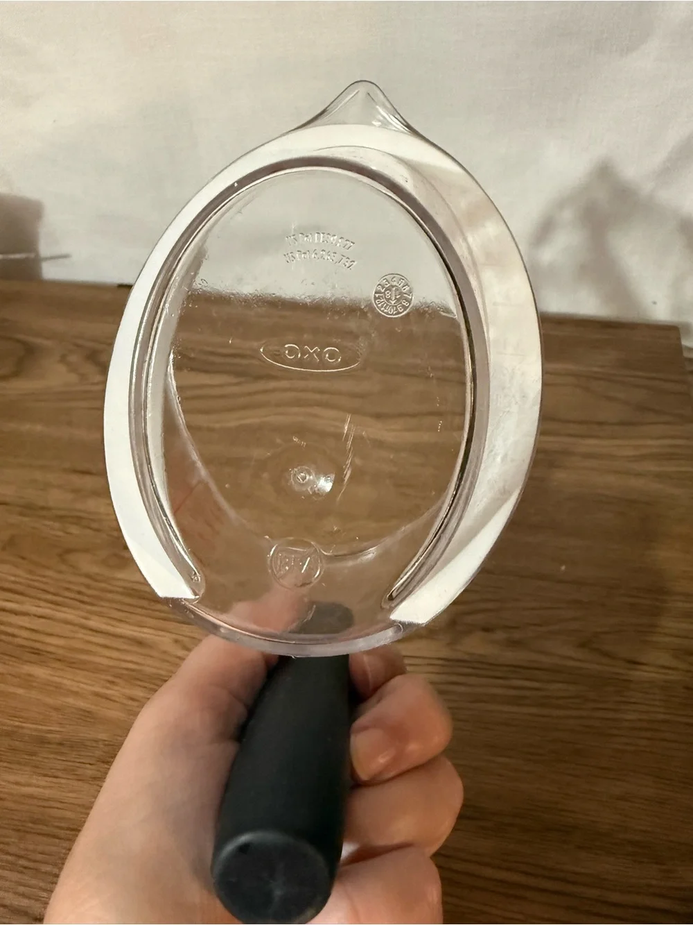 Oxo Clear Plastic Measuring Cup with Black Handle and Red Markings